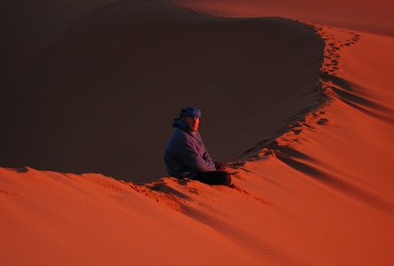Marokko mit Kindern - Reisetipps zur Marokko Familienreise - Mann in der Wüste